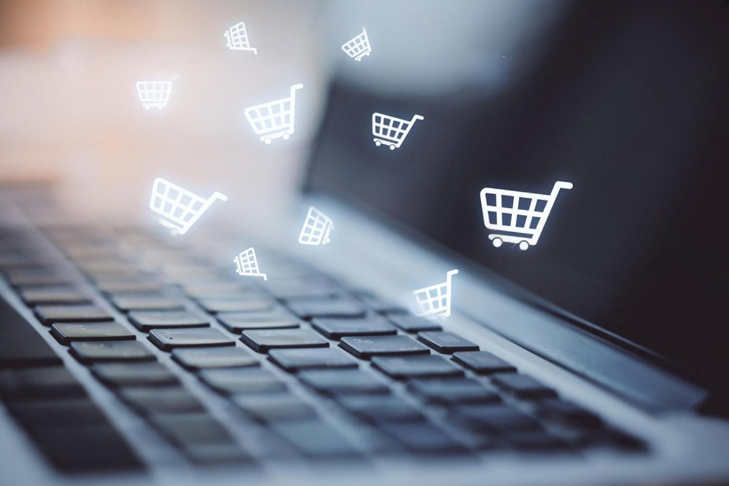 Laptop with e-commerce icons representing supplier cybersecurity and digital procurement risk